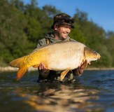 Vass Camo Chest Waders Fishing Man stood in lake with carp
