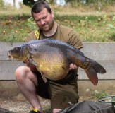 Team Vass printed tee shirt with yellow strap and easy bac fishing trainers carp angler ken